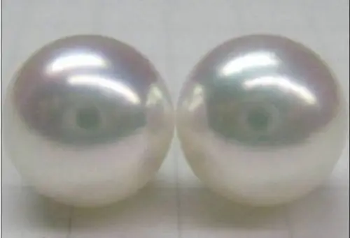 

PAIR OF 13MM SOUTH SEA GENUINE PERFECT ROUND WHITE LOOSE PEARL UNDRILLED