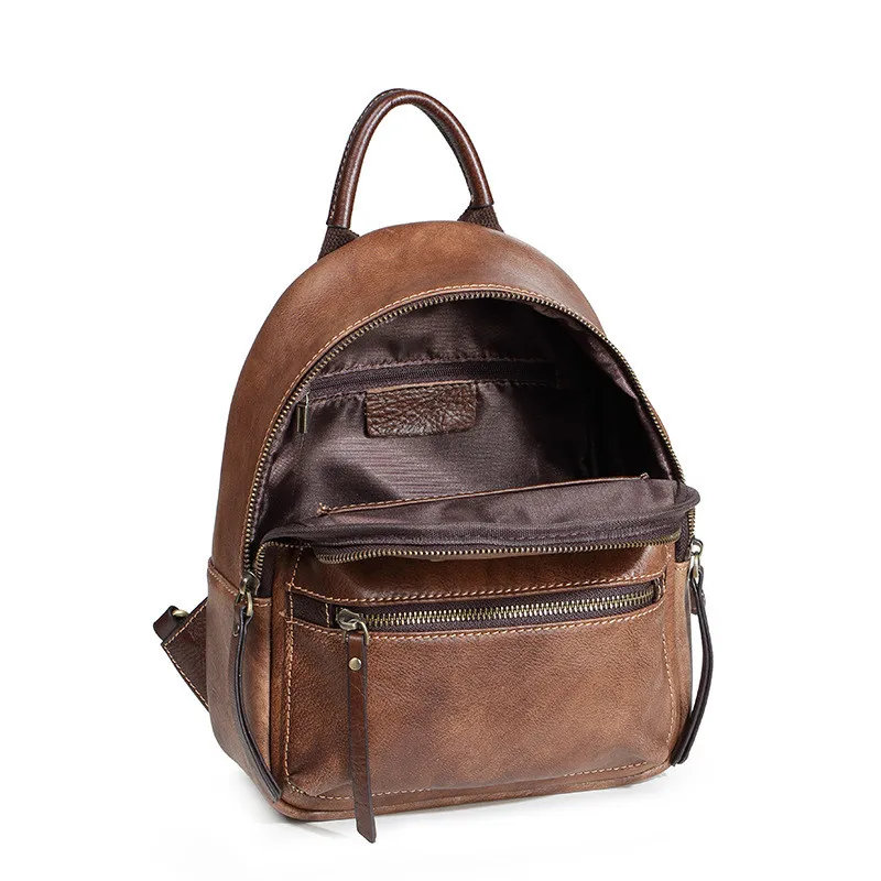 PNDME high quality vinateg top layer cowhide ladies backpack casual embossed genuine leather daily female small sling rucksack PNDME high quality vinateg top layer cowhide ladies backpack casual embossed genuine leather daily female small sling rucksack