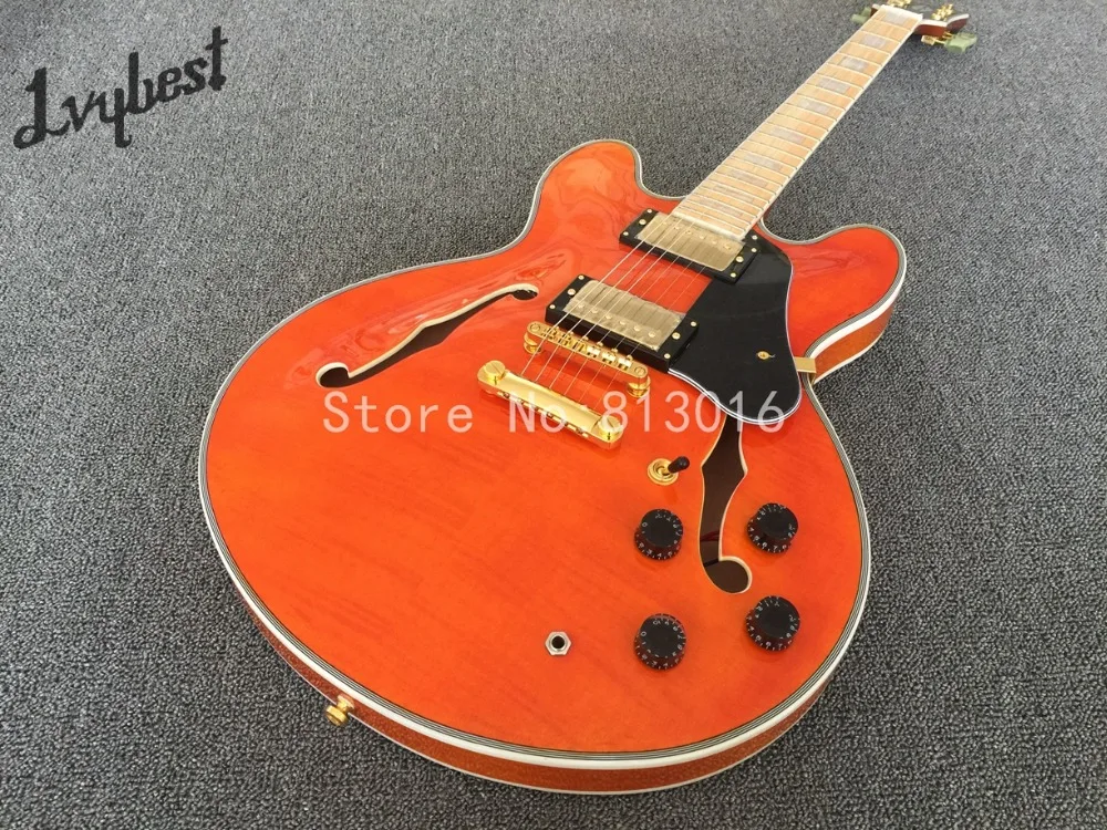 

Electric guitar lvybest hollow body jazz orange see thru ,flame top and back,maple fingerboard,mahogany neck,high grade!