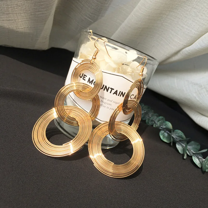

Trend Women's Earrings Ring Multi-layer Exaggerated Shiny Alloy Rotating Fashion Creative Geometric Gold Silver Earrings