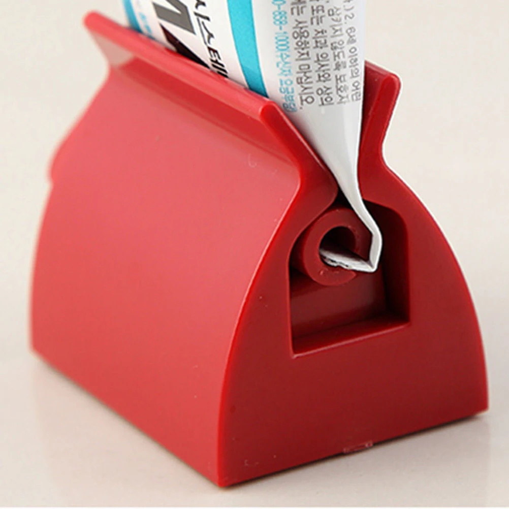 

1Pc Rolling Tube Toothpaste Squeezer Toothpaste Easy Dispenser Seat Holder Stand Bathroom Accessories