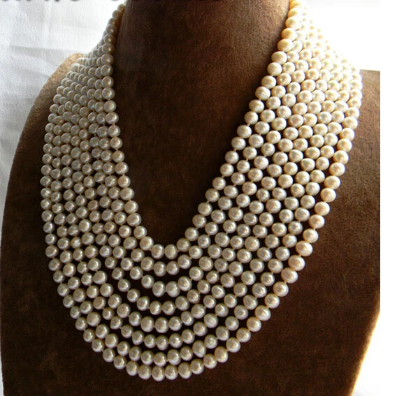 

> A 8Strands 18'' 7mm Round White Freshwater Pearl Necklace