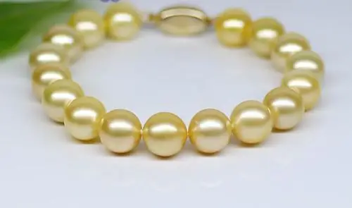 

FREE SHIPPING HOT sell new Style >>>> elegant 9-10mm AAA +south sea round gold pearl bracelet7.5-8inch silver