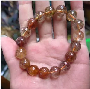 

100% Narural Gold Rutilated hair Quartz Crystal stretch Hand catenary