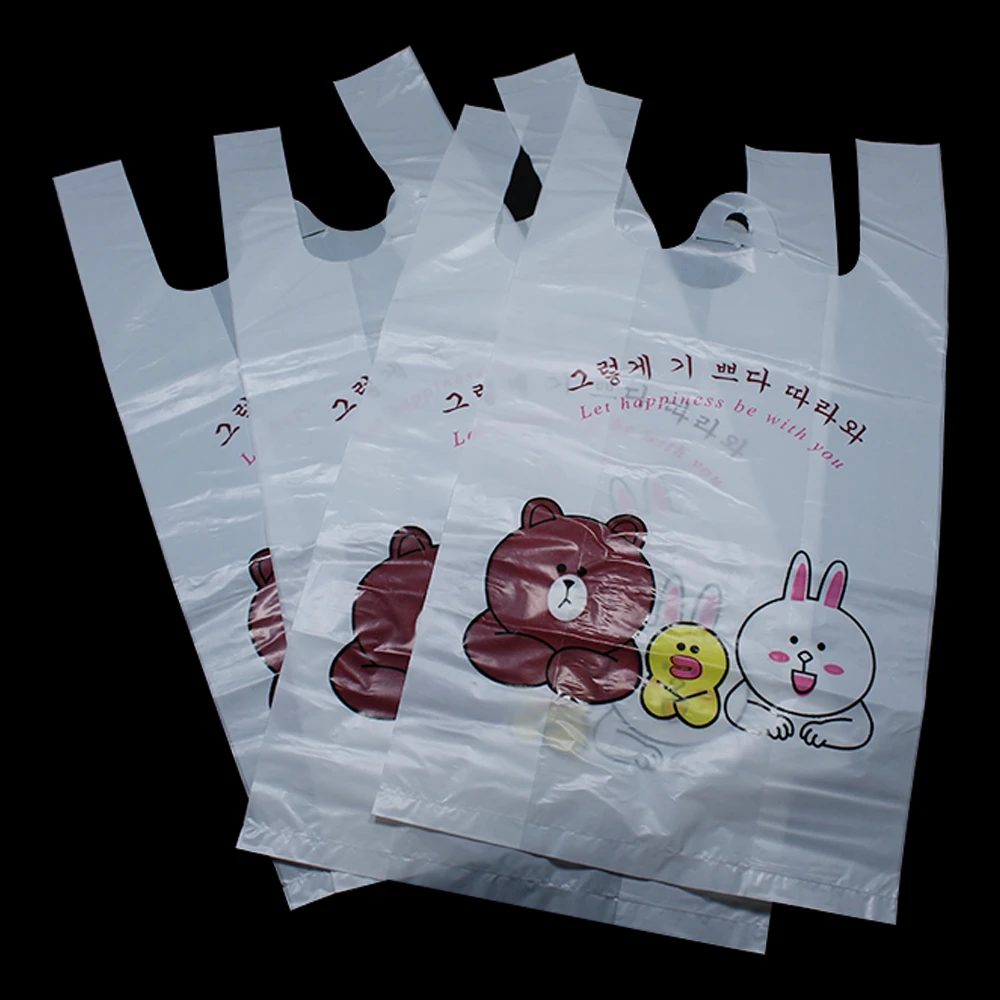 100pcs / lot White Translucent Plastic Vest Bag With Handle Lovely Cartoon Bear Rabbit Printing ...