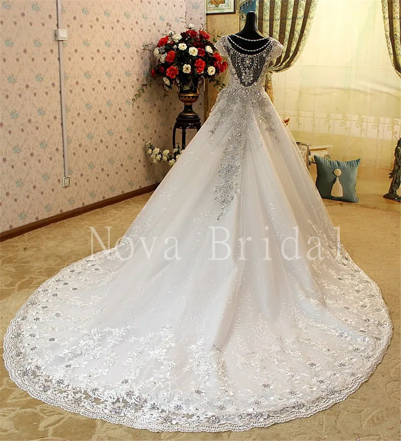 Индивидуальный заказ Роскошная свадебная одежда трапециевидной формы Тюль бальное платье принцессы тяжелый бусины кристаллы свадебное платье Vestido De Noiva IZ179