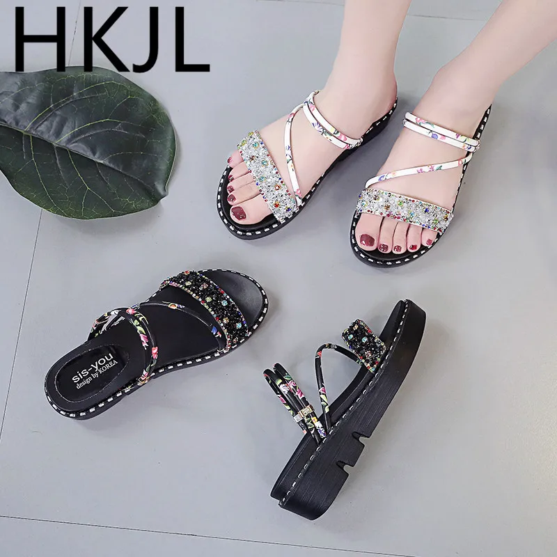 

HKJL The 2019 summer Korean version of the new flat slope heel buckle buckle floral open toe wear versatile women's sandals A816