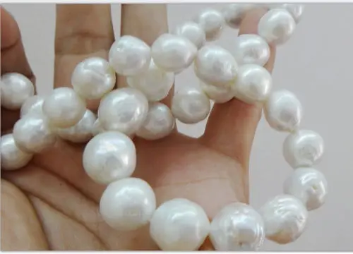 

15MM AUSTRALIAN SOUTH SEA WHITE NUCLEAR PEARL NECKLACE 14K CLASP
