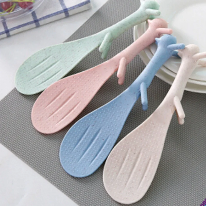 

1pcs Lovely Squirrel Shape Vertical Nonstick Rice Spoon Plastic Handle Creative Rice Shovel Kitchen Gadgets