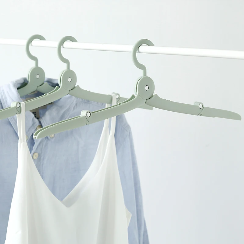 

Tourism portable foldable clothes rack Scalable clothes-horse travel magic clothing hangers business antiskid windbreaker