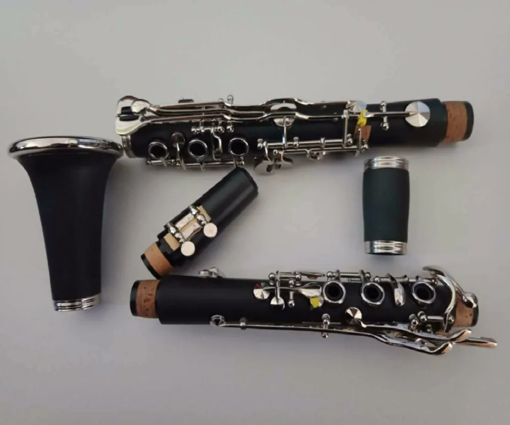 

Excellent clarinet German system Bb ebonite 20 KEYS good technique