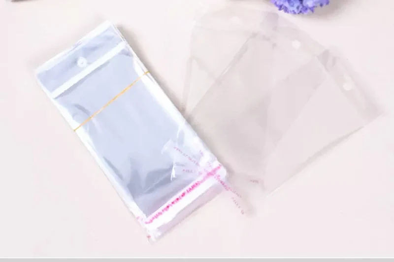 100pcs 7x14cm Clear Self Adhesive Seal Plastic Bags Transparent Resealable OPP Packing Poly Bags Pick Beads Hanging Holes
