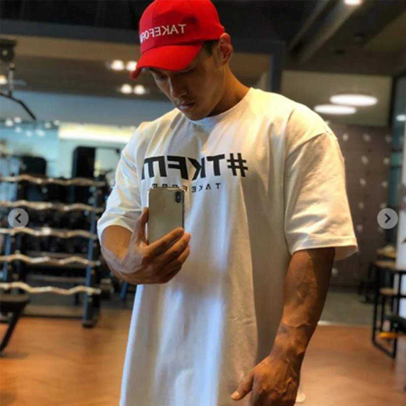 

Brand Fashion large size loose T Shirt Men Fast compression Breathable Mens Short Sleeve Fitness t-shirt Gyms Tight Casual Top