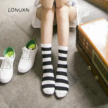 

A pairs girls Spring New cotton comfortable heap pile socks striped spell color long tube breathable absorbent Socks for women
