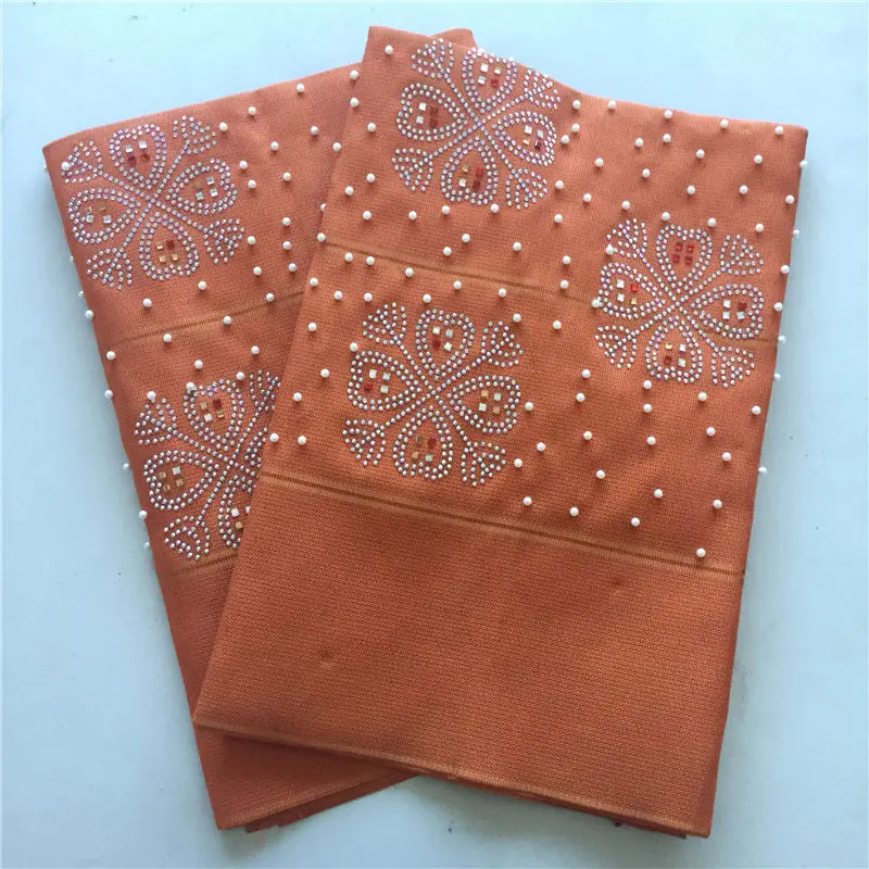 

Nigerian ASOOkE gele with beads and stones A-CLASS aso oke headtie for ladies party weeding shoulder and headtie orange gele