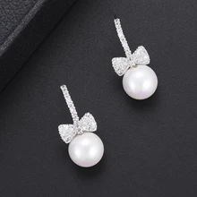 GODKI модные серьги-гвоздики с кубическим цирконием и бантом, имитация жемчуга для женщин, модные ювелирные изделия, свадебные серьги Brincos Femme