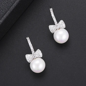 

GODKI Fashion Cubic Zirconia Bowknot Imitation Pearl Stud Earrings for Women Fashion Jewelry Wedding Bridal Brincos Femme 2018
