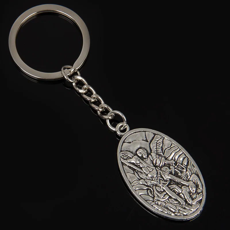 

Punk Vintage Bible Archangel Saint Michael Pendant Keychain St.Michael Keyring Archangel Angel Wings Jesus Key Chain Car Holder