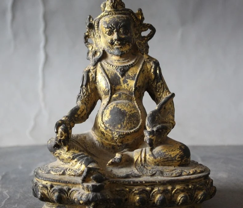 

Old Tibetan Buddhism temple gilt bronze Yellow Jambhala Dzambala Buddha statue