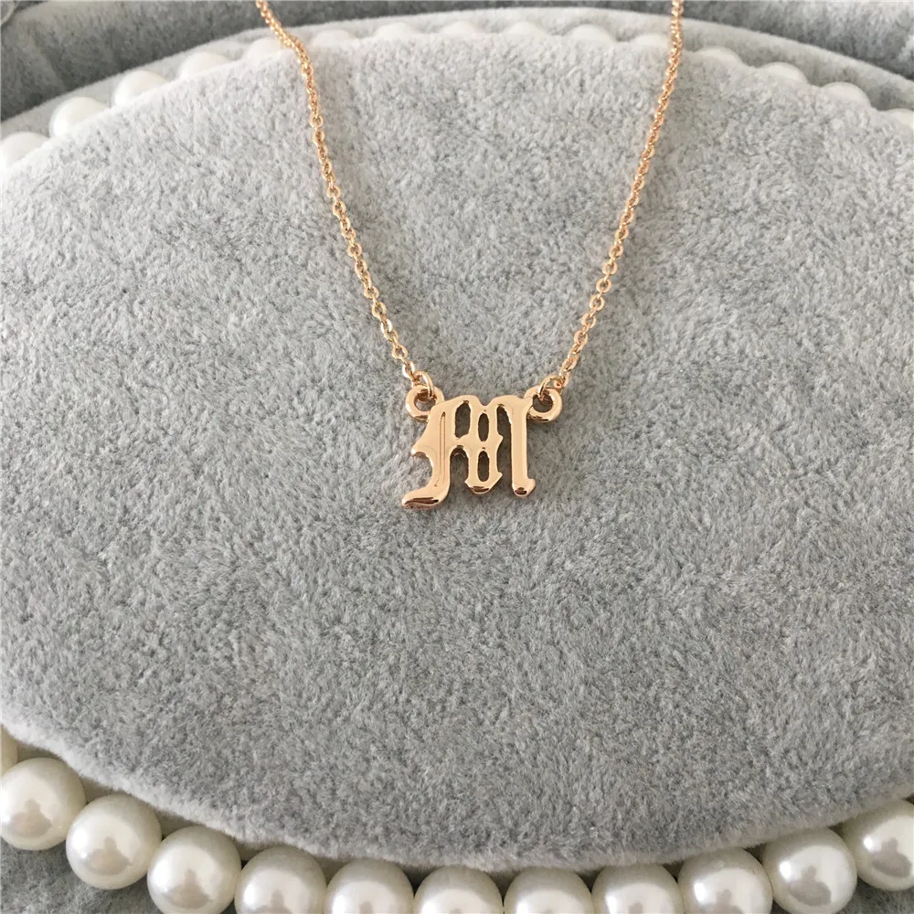 

CASUAL GOLD COLOR OLD ENGLISH FONT M or A LETTER NECKLACE