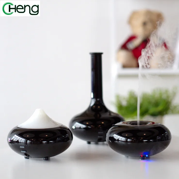 

Black New Fashion Mini Air Purifier And Ultrasonic Humidifier Aroma Essential Oil Diffuser home and Office Make Mist Three Type