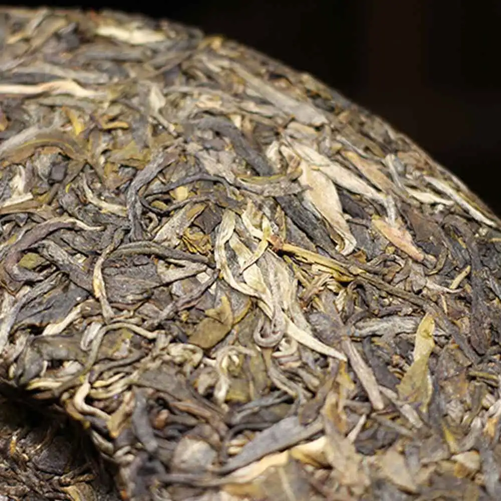 Год Mingfeng горный Древний дерево Pu-erh сырой Pu-erh 357 г Sheng Pu-erh