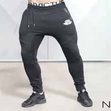 2016 marke Neue Goldmedaille Fitness Beiläufige Elastische Hosen Stretch Baumwolle herren Hosen Körper Ingenieure Jogger Bodybuilding