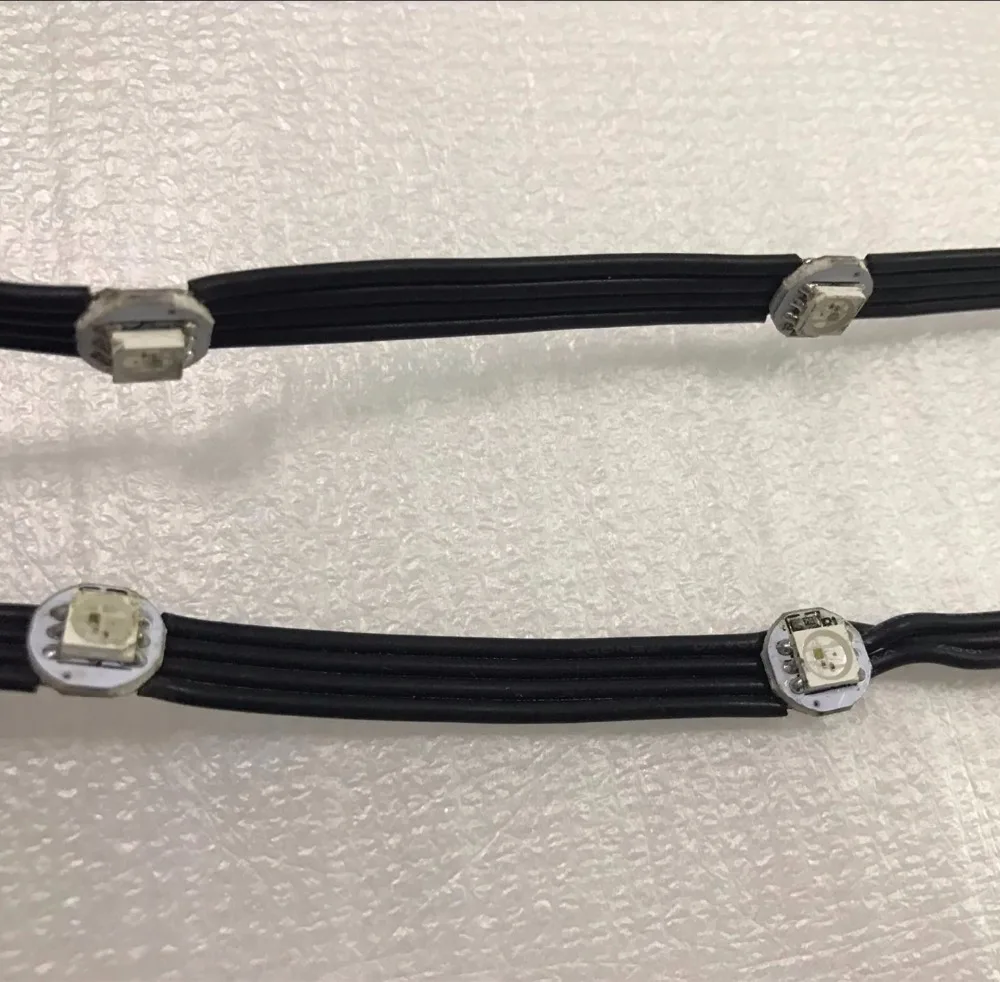 

100pcs/string WS2813-RGB full color addressable LED pixel light with heatsink;DC5V input;with all black wire;5cm wire spacing