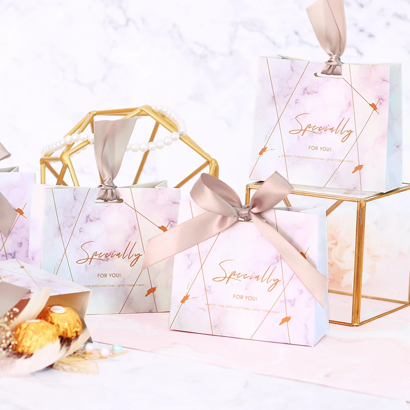 

Free Shipping 50pcs ribbon Tote shaped Wedding party favor Unique Pink marble boxes baby shower guests candy chocolate bag