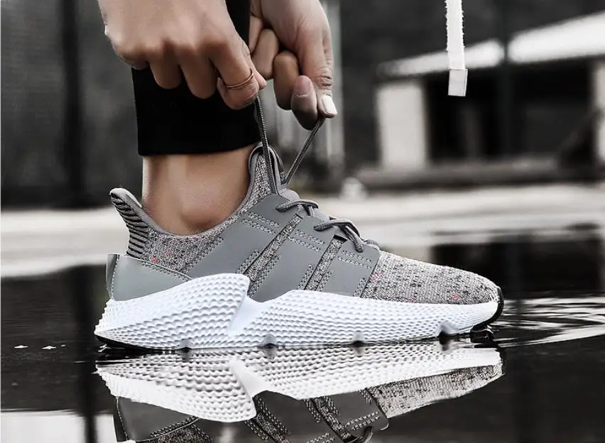 

2018 casual men's shoes spring and autumn flying woven shoes comfortable high quality breathable men's shoes shock absorber shoe