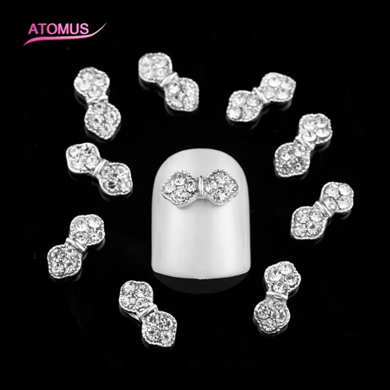 

10pcs/pack 3D Rhinestone Faux Pearl Rhinestone Decoration AB flower bow tie Rhinestone Nail Art Alloy Decoration K025