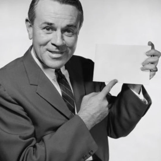 Close-up of a businessman pointing to a blank placard Poster Print (18 x 24)