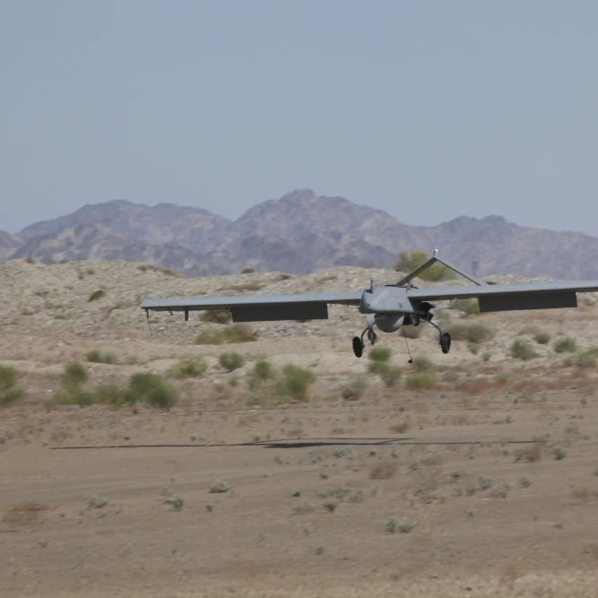 An RQ-7B Shadow unmanned aerial vehicle prepares to land Poster Print (34 x 22)
