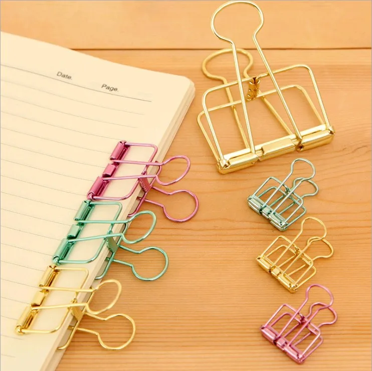 

1pcs Simple metal hollow office file dovetail clamp Color paper clip Hand account tail clip Large and medium sized