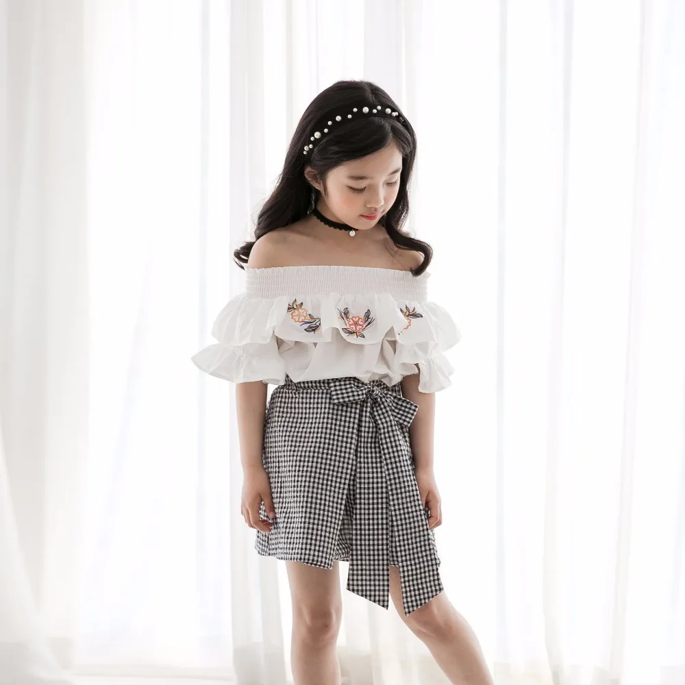 

Korean Fashion Designser Children Clothing Sets Open Shoulder Floral Blouse Tops And Cotton Plaid Skirts 2pcs Girl Clothes Suits