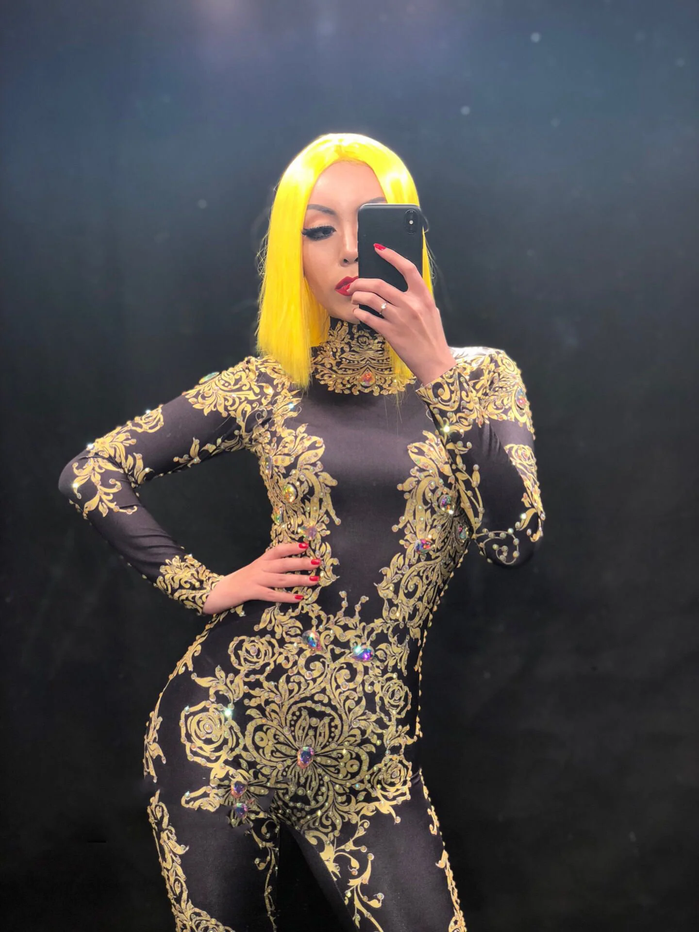 black jumpsuit with yellow flowers
