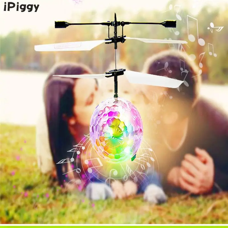 ipiggy Радиоуправляемый Дрон вертолет ручной Spinner мяч встроенный сверкающих Светодиодное освещение с Диско Музыка для детей Красочные полетах игрушка
