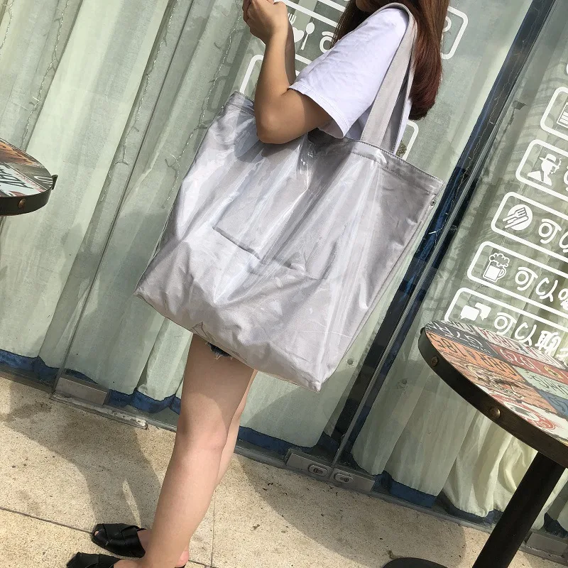 

2019 South Korea New Simple Fashion Large Capacity Tote Bag Two-color Waterproof Pvc Shoulder Portable Big Female Bag
