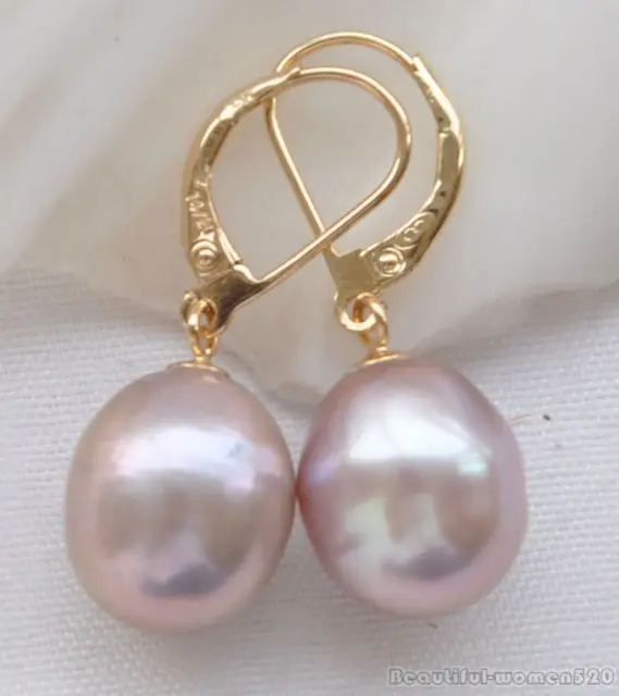 

a pair of elegant natural south sea pink pearl earrings 14