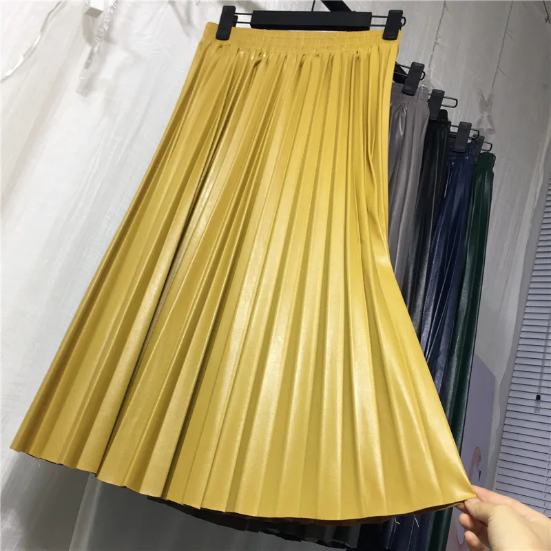

2019 New Women PU Leather Pleated Skirt Autumn Winter Casual Basic Solid Color Empire Elastic High Waist Mid Calf Pleated Skirt