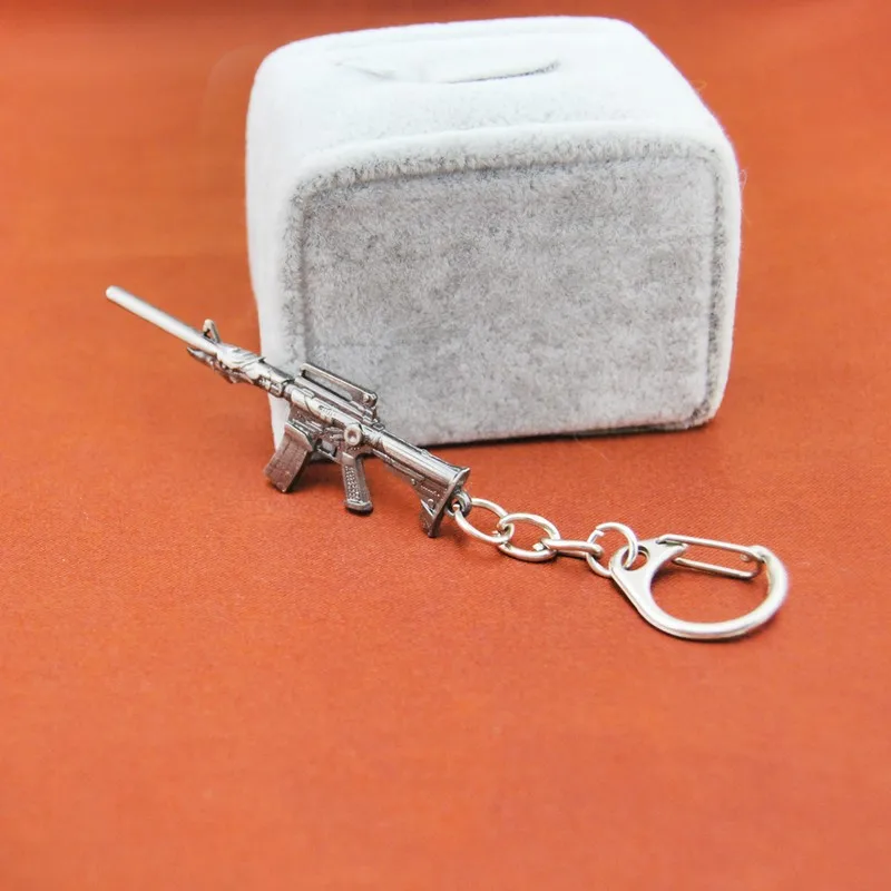 

Fashion M16 Toy Gun Pendant Keychain Weapon Key Chain Ring Cross Fire CF Game Assault Rifle Men Jewelry Accessory Trinket Gift