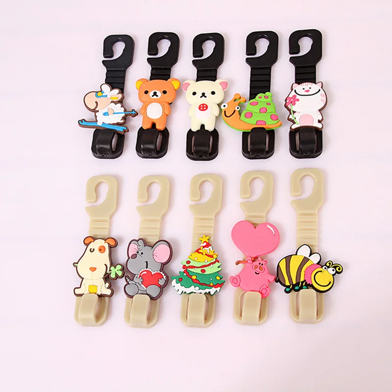 

1 pair of cute cartoon car back seat headrest hanger hook bag wallet cloth grocery storage car fastener clip