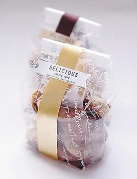 

50pcs/lot-25*8.5+6cm White alphabet clear plastic flat pocket biscuit candy bag party wedding Gift bag DIY baking packaging
