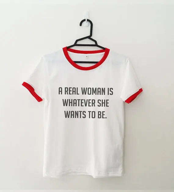 

A REAL WOMEN IS WHATEVER SHE WANTS TO BE women t shirt ringer tee funny tshirt tumblr feminist shirt graphic tee gift for women