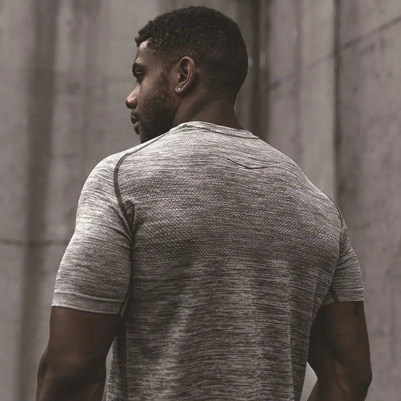

Men T-shirt Quick Dry Bodybuilding Short Sleeve Mens Tshirt Gyms Shirt Men Muscle Tights Fitness T Shirts