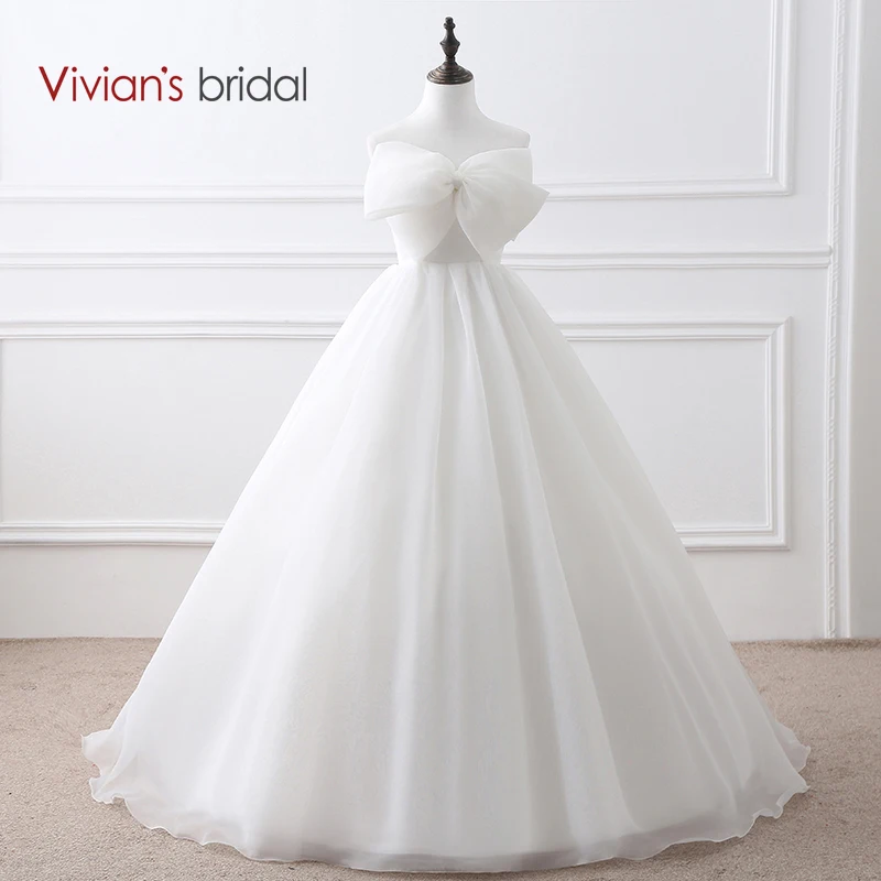 

Vivian's Bridal Simple Design Strapless Sleeveless Organza Ball Gown Wedding Dress Long With A Bow SQ22408