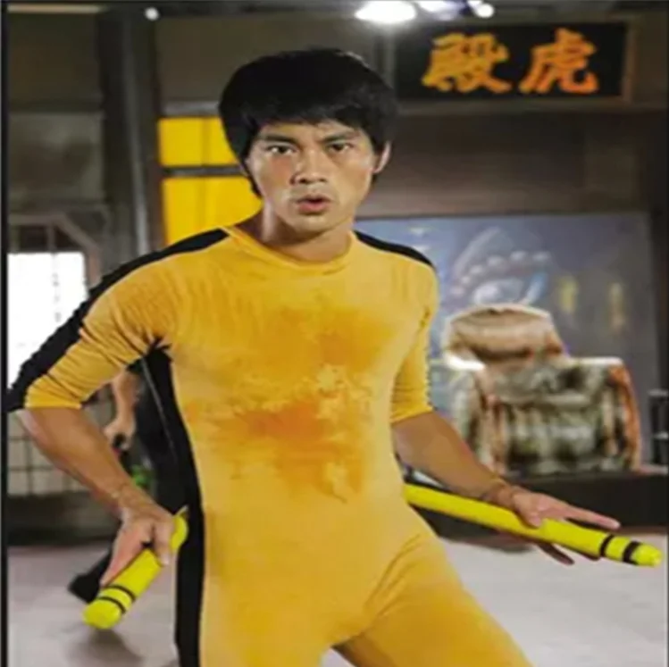 bruce lee in yellow outfit