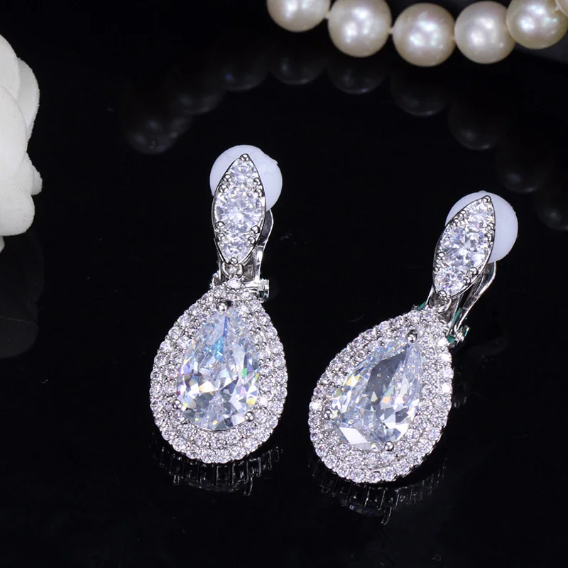 Фото CWWZircons Модные женские серьги-подвески белого и золотого цвета с фианитами Королевский синий кристалл без проколов серьги-клипсы ювелирные изделия CZ164 №3