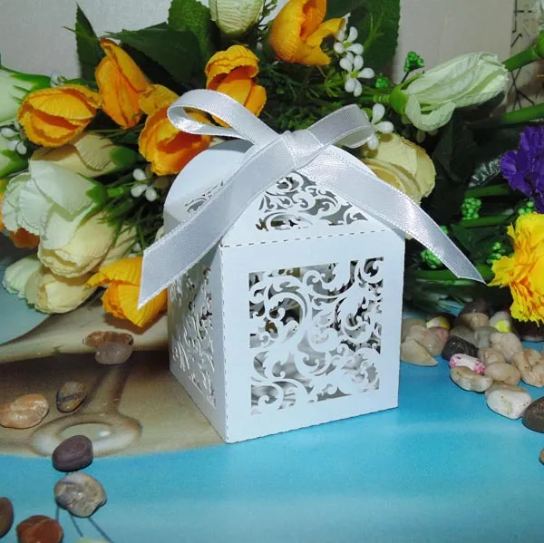 

Free Shipping 10pcs White Vine Filigree Laser Wedding Candy Boxes Favour Box With Ribbon