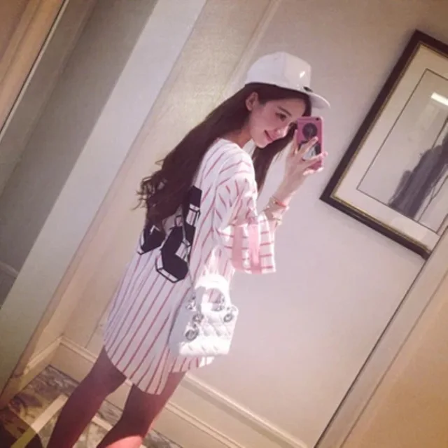 pink and white baseball jersey